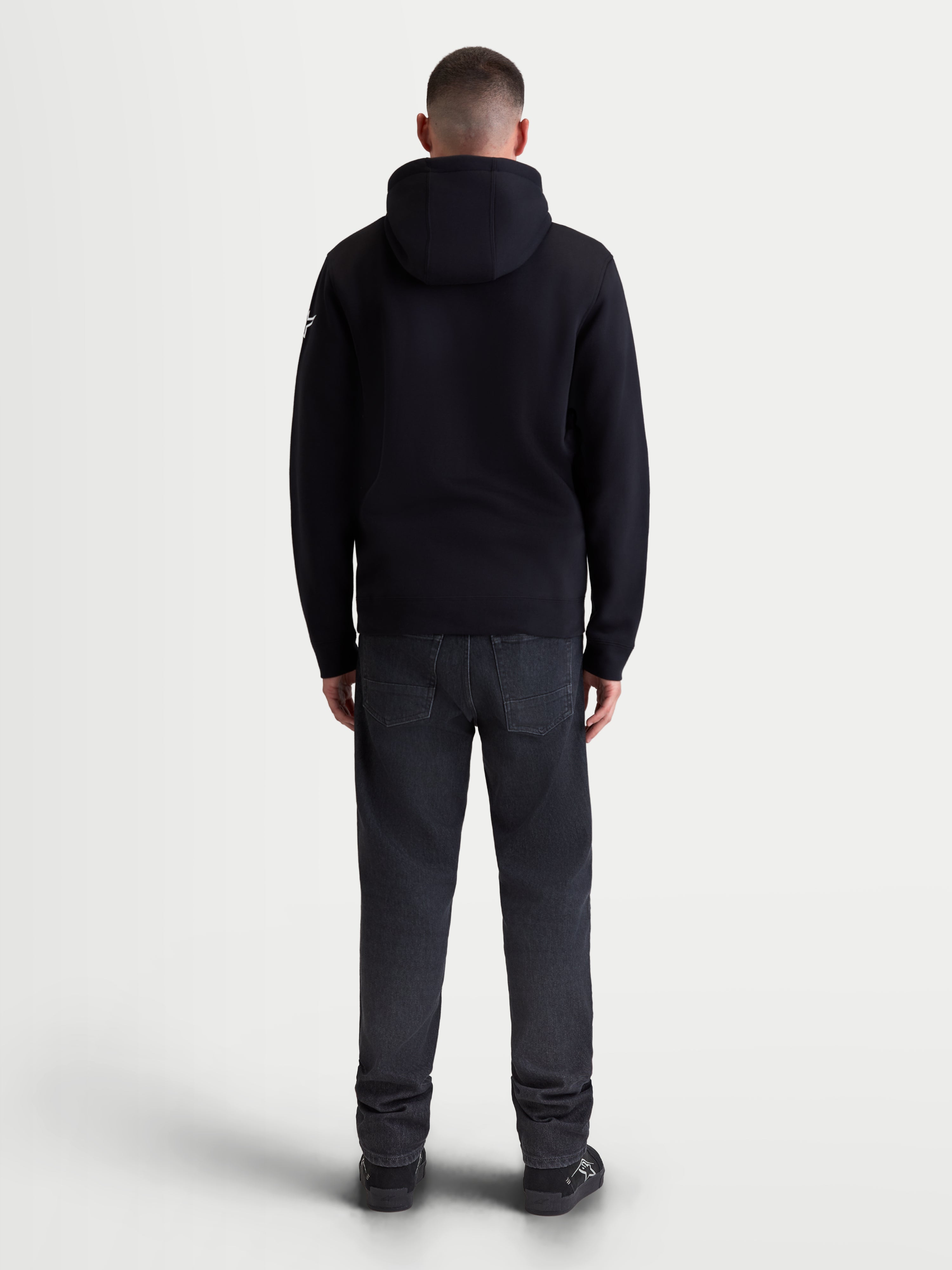 Alpinestars Sweat À Capuche Race Wordmark, sweat à capuche polaire sportswear pour homme, noir, vue de dos montrant la capuche doublée et la coupe décontractée, style motorsport.
