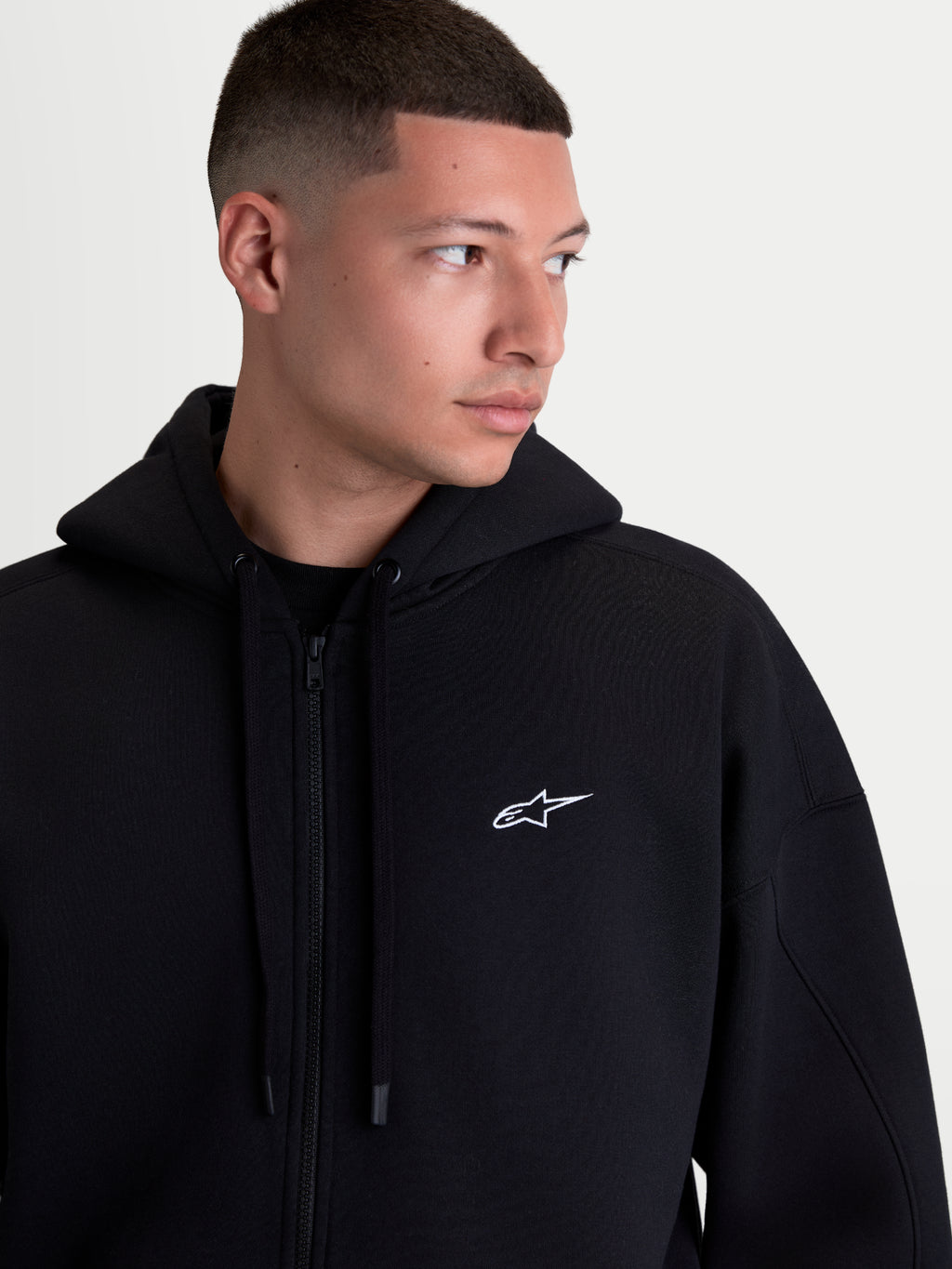 Alpinestars Sweat À Capuche Pioneer Oversize, sweat à capuche zippé sportswear en polaire pour homme, noir avec logo Astars blanc brodé sur la poitrine, fermeture éclair Vislon, coupe oversize décontractée