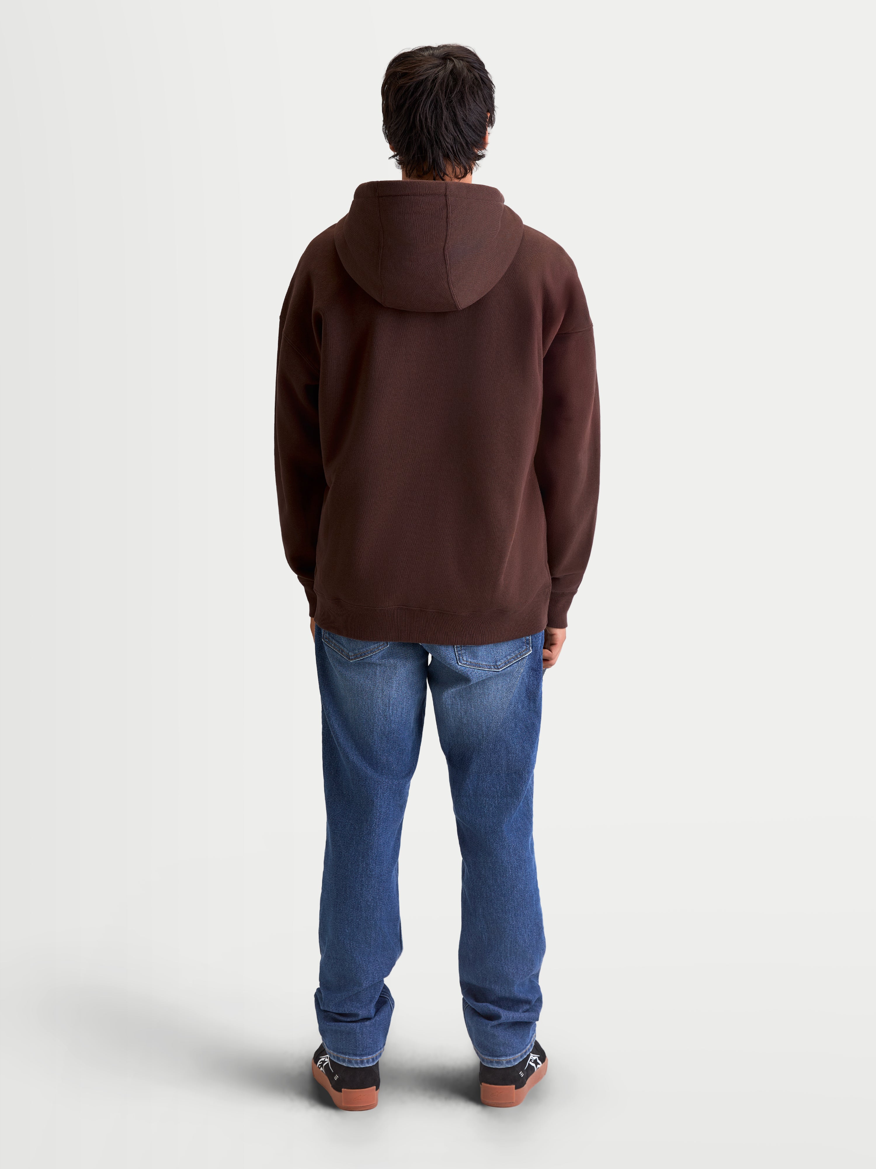 Alpinestars sweat à capuche Entity Oversized, sweat à capuche zippé sportswear marron, vue de dos sur modèle, coupe décontractée oversized, polaire en coton recyclé premium, vêtement casual lifestyle.