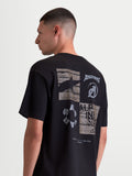 Alpinestars Checkback Oversized CSF T-shirt, heren sportswear t-shirt met korte mouwen, zwart en grijs, met een opvallende checkergraphic op de rug met Astars-branding, ontspannen oversized pasvorm, rugaanzicht op model.