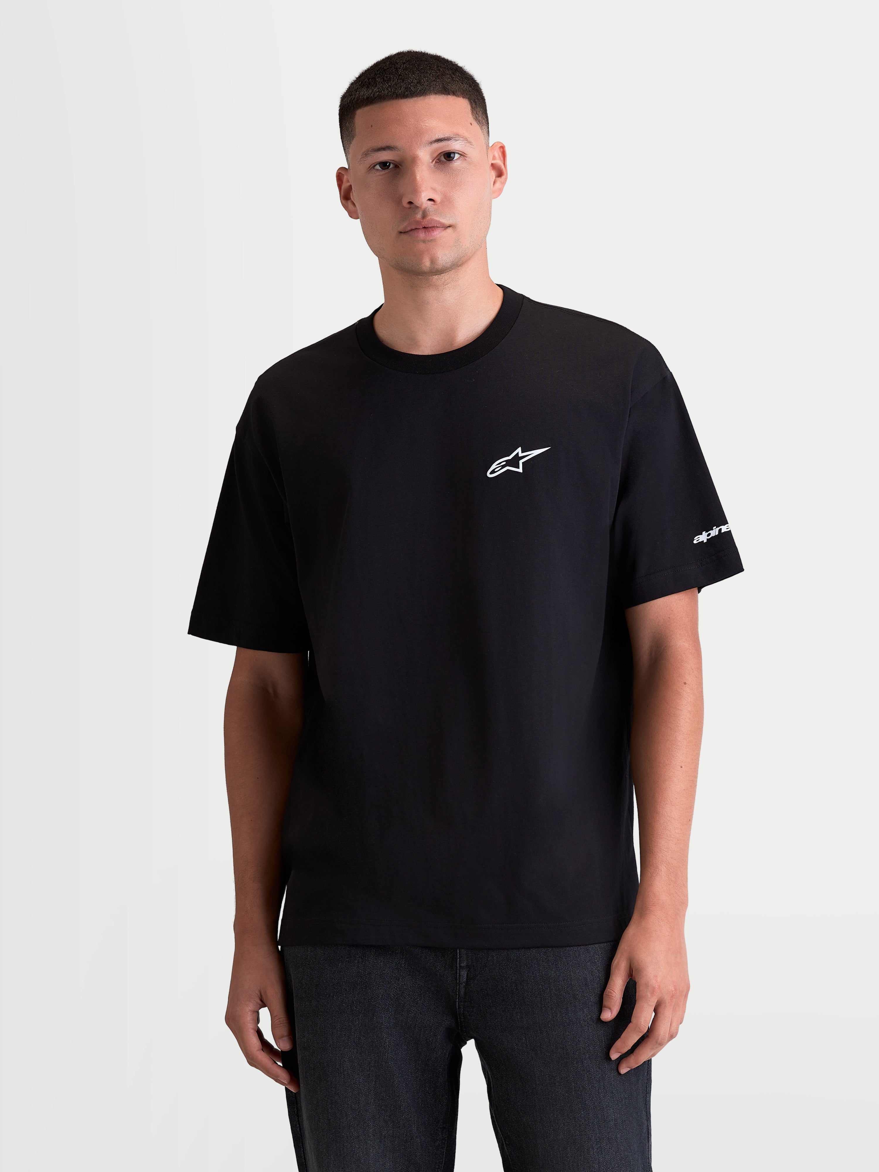 Alpinestars Mandate Oversized CSF, t-shirt de sportswear à manches courtes pour homme, noir avec logo Astars blanc en impression puff sur la poitrine, coupe oversized décontractée