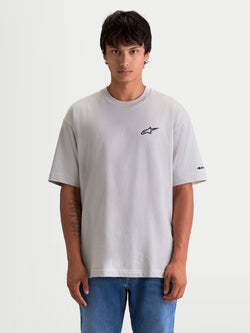 Alpinestars Mandate Oversized CSF T-Shirt, Kurzarm-Sportswear-T-Shirt für Herren und Damen, Grau, Baumwoll-Polyester-Mix, entspannte Oversized-Passform mit schwarzem Astars-Logo-Puffdruck auf der Brust und Markendetail am Ärmel.