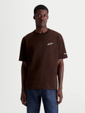 Alpinestars Mandate Oversized CSF T-shirt, casual heren-T-shirt met korte mouwen, bruin en wit, voorzien van een puff-print Astars-logo op de borst, relaxed oversized pasvorm, zachte katoen-polyester mix.