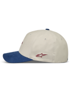 Alpinestars County Canvas hoed, sportpet in zand en blauw met gebogen klep en rood logo, zijaanzicht.