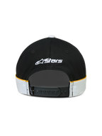 Alpinestars Casquette 500 Snapback, casquette sportswear lifestyle noire et blanche avec accents jaunes, vue arrière avec fermeture snapback réglable, logo Astars blanc brodé et passepoil contrasté.