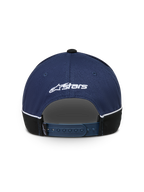 Alpinestars 500 Snapback pet, sportswearpet, blauw en zwart, achteraanzicht met verstelbare snapbacksluiting, wit geborduurd Astars-logo en contrasterende biezen.