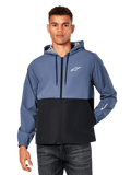 Veste coupe-vent Alpinestars Speeder, coupe-vent décontracté à capuche, design bicolore bleu ardoise et noir, logo Astar blanc sur la poitrine et marquage sur la manche, fermeture éclair frontale avec capuche à cordon de serrage, doublure en mesh légère
