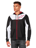 Alpinestars Sessions V3 Hoodie, sweat à capuche zippé, noir avec panneaux blancs et détails rouges, doté d'une fermeture éclair rouge, d'une capuche doublée en mesh et du logo étoile Alpinestars sur la poitrine, streetwear décontracté inspiré du sport automobile