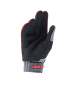 Gants Alpinestars Youth A-Dura, gants de VTT, rouge fluo et noir, vue de la paume montrant la matière en daim synthétique, manchette en néoprène gris avec sangle à scratch arborant le logo Alpinestars rouge, conçus pour le cyclisme junior