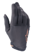 Gants Alpinestars A-Aria, gants de VTT (MTB), noir avec logo étoile or rose, dotés d'un motif quadrillé texturé sur les doigts et d'un tissu extensible léger pour le trail
