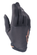 Gants Alpinestars A-Aria, gants de VTT (MTB), noir avec logo étoile or rose, dotés d'un motif quadrillé texturé sur les doigts et d'un tissu extensible léger pour le trail