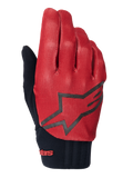 Gants de VTT Alpinestars A-Dura, orange foncé et noir, dessus texturé avec motif de grille, grand logo étoile noir, manchette en néoprène noir avec marquage rouge, conçus pour l'adhérence et la performance en VTT