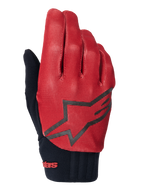 Gants de VTT Alpinestars A-Dura, orange foncé et noir, dessus texturé avec motif de grille, grand logo étoile noir, manchette en néoprène noir avec marquage rouge, conçus pour l'adhérence et la performance en VTT