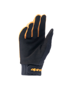 Alpinestars A-Dura handschoenen, mountainbike handschoenen, donkergoud en zwart, binnenzijde toont synthetisch suède materiaal, neopreen manchet met gouden klittenbandsluiting aan de pols, ontworpen voor grip en mobiliteit bij het fietsen