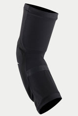 Genouillères Alpinestars Youth Paragon Plus, noir et blanc, manchon de protection à enfiler doté d'une maille extensible respirante et d'une conception ergonomique préformée pour le VTT et le tout-terrain.
