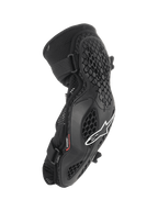 Coudières Alpinestars Bionic Pro, protections de coude VTT, noires avec logo blanc, structure en grille alvéolée, châssis en maille respirante, doubles sangles ajustables, design ergonomique pour le tout-terrain et le VTT