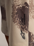 A-Dura Ride Shorts in sand camo met het Astar-logo op duurzame 4-way stretch technische geweven stof.
