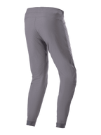 Alpinestars A-Dura Hose, MTB-Fahrradhose, Dunkelgrau, Dreiviertel-Rückansicht, zeigt das strapazierfähige 2-Wege-Stretch-Gewebe, elastische Bündchen und eine ergonomische Passform für Mountainbike-Trail-Performance.