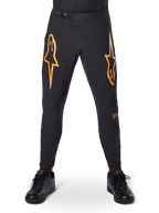 Pantalon de course Alpinestars A-Supra, pantalon de cyclisme VTT, noir avec logos orange vifs, doté d'une fermeture à rochet à la taille et d'une ventilation perforée au laser, coupe performance conçue pour la course de VTT tout-terrain