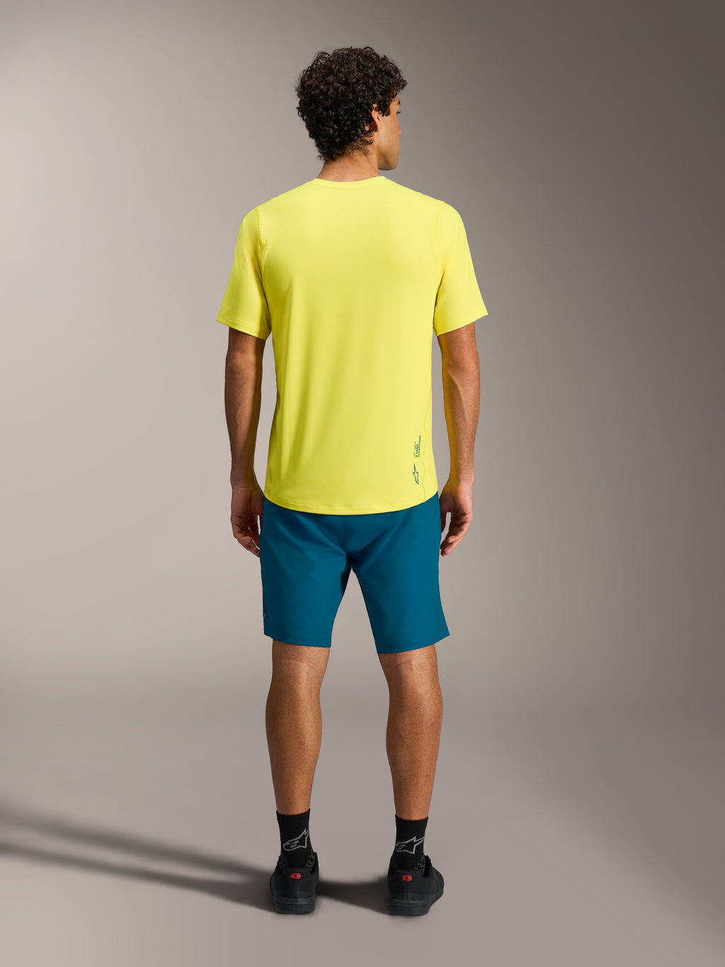 Maillot A-Dura Ride jaune fluo, vue de dos du haut de VTT respirant à manches courtes et coupe décontractée.