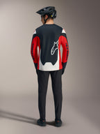 Rode A-Dura Race Jersey met lange mouwen, zwart-witte panelen en een groot Astars-logo op de rug voor MTB-prestaties.