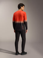A-Dura ASTARS Jersey 2.0 met lange mouwen en oranje-zwart kleurverloop, mountainbikeshirt vanaf de achterkant.