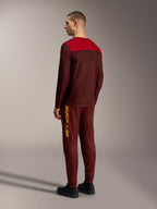Alpinestars A-Dura Elite 2.0 trui met lange mouwen, bordeaux en rood, achteraanzicht van technische MTB-trail kleding.