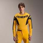 Set d'Équipement Alpinestars Limited Edition A-Supra Melt Gold, maillot de VTT à manches longues jaune et pantalon assorti, logo astars noir sur la poitrine, coupe performance athlétique pour le VTT
