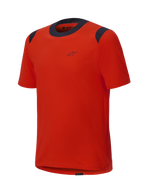 Alpinestars A-Dura Dri Wool Jersey met korte mouwen, Spicy Orange met zwarte mesh panelen op de kraag en schouders, minimalistisch ontwerp met een klein logo op de borst, technische mountainbike kleding