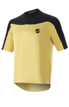 Alpinestars Drop Meta Jersey - korte mouwen, MTB-fietsshirt, goud en zwart, mesh-constructie met kleurvlakken op de schouders, rond logo op de borst en een verlengde achterzoom.