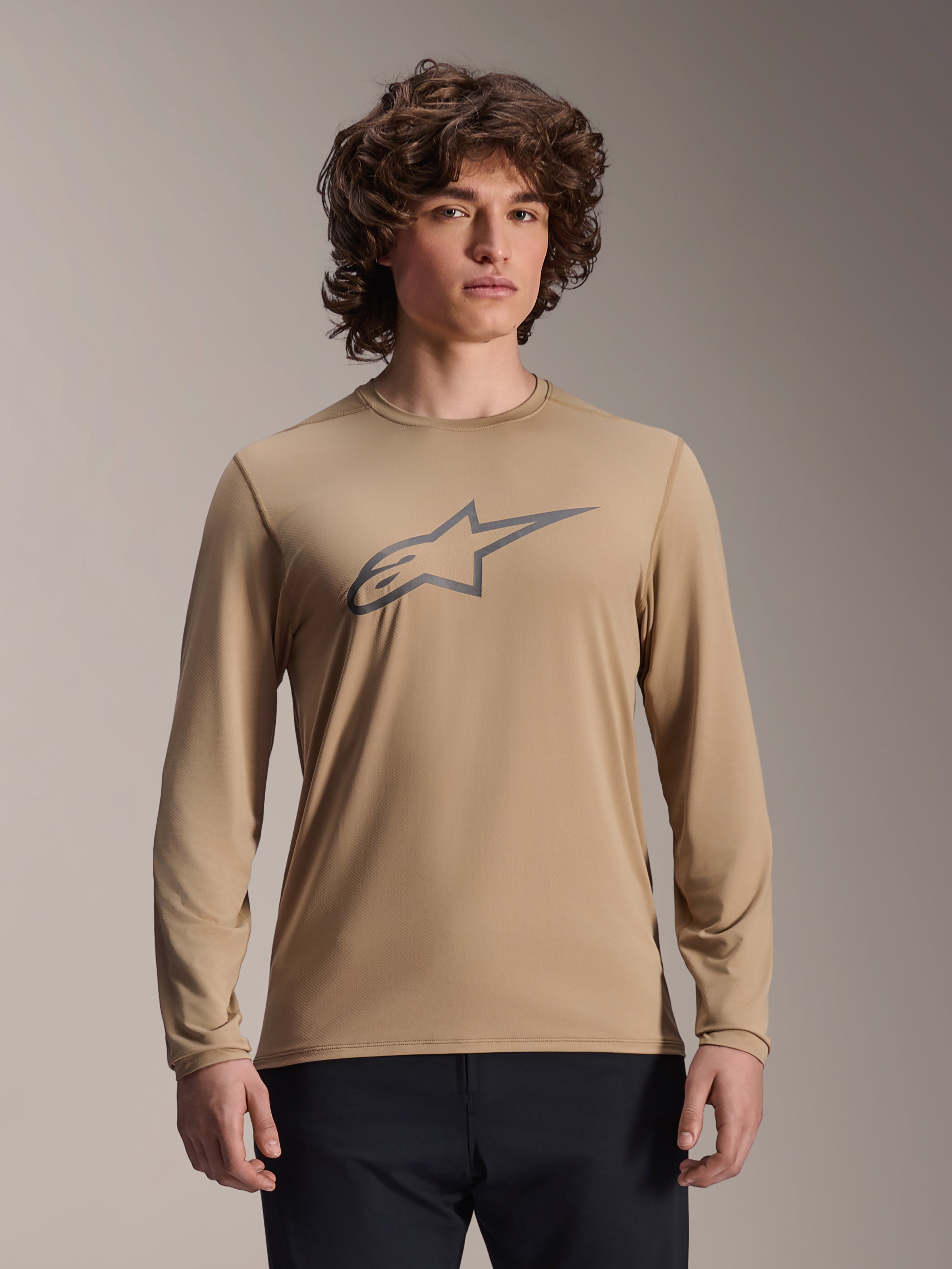 Alpinestars A-Dura Astar Long Sleeve Jersey, Light Brown, MTB mountain biking shirt, featuring a large dark gray Astars logo on the chest, regular fit, technical moisture-wicking fabric for off-road performance