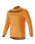 Alpinestars Youth A-Dura Rocker Jersey met lange mouwen, donkergoud, met zwart Alpinestars-woordmerk en logo op de borst, ronde hals, verlengde achterzijde, lichtgewicht performance mountainbike-kleding