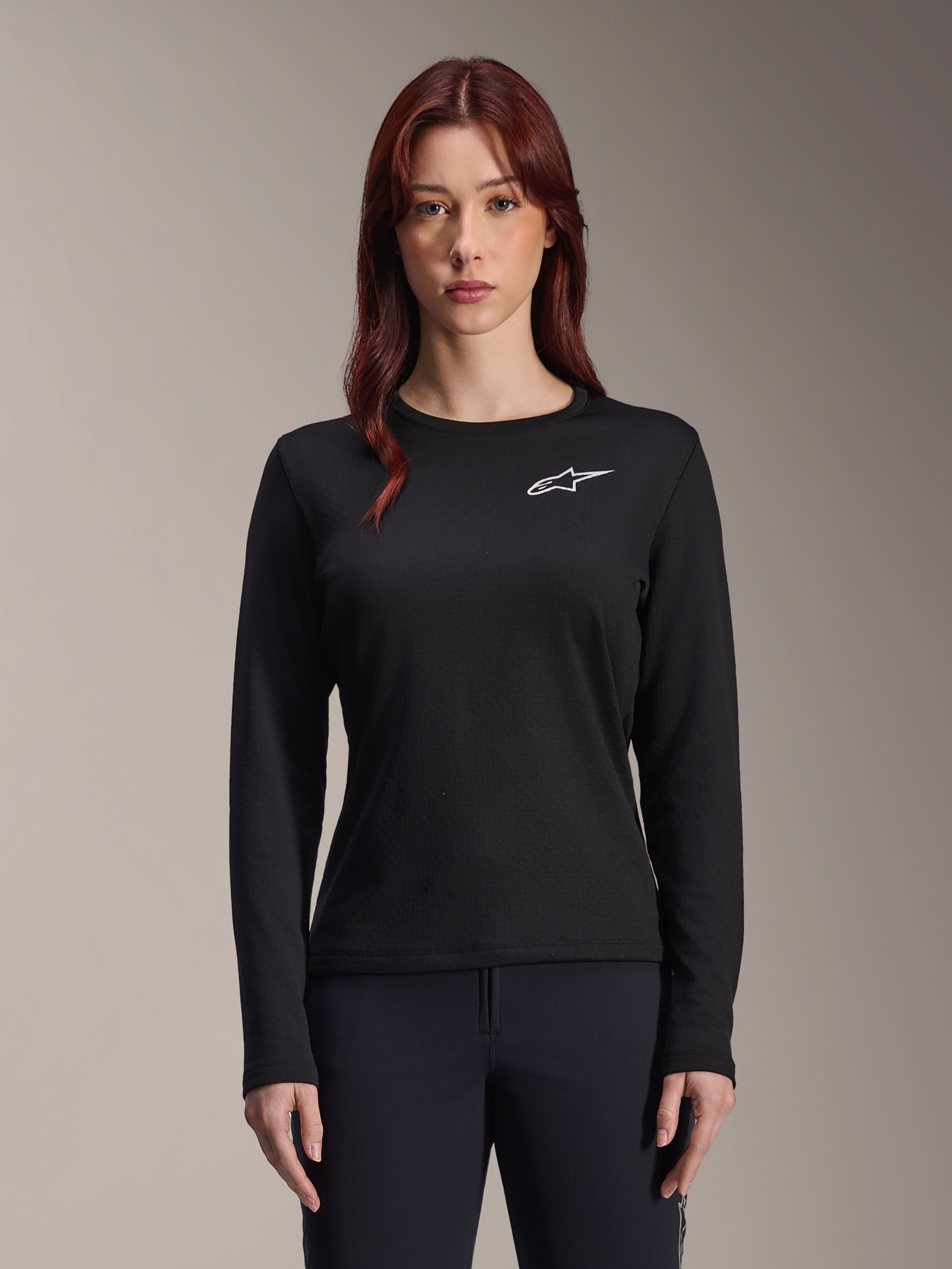 Alpinestars Stella A-Dura Thermal Jersey, MTB-fietsshirt voor dames met lange mouwen, zwart met wit sterlogo op de borst, lichtgewicht geïsoleerde stof voor fietsen in koud weer, ontworpen voor laagjes en comfort op de trail