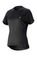 Alpinestars Stella Alps Constellation Jersey pour femme, maillot de VTT à manches courtes, noir avec de subtiles rayures horizontales sur la poitrine, petit logo blanc, col rond, dos rallongé pour plus de protection, tissu léger et respirant pour le VTT