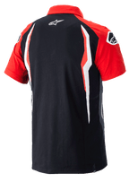 Polo Honda Alpinestars, polo à manches courtes, rouge et noir, vue arrière avec panneaux latéraux contrastés et logo Alpinestars dans le dos, vêtement sportswear décontracté
