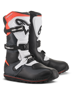 Alpinestars Tech-T Boots, Motorcycle Trials Boots, Black White and Red Fluo, featuring a triple buckle closure system, ergonomic shin plate, textured toe protection, and a low-profile lugged sole, technical off-road footwear design