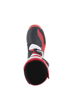 Alpinestars Tech-T Stiefel, Trial-Motorradstiefel, Hellrot, Schwarz und Weiß, Draufsicht mit Fokus auf die innere Knöchelöffnung und den Zehenbereich, mit schwarzen strukturierten Paneelen, roten Akzenten und weißen Details, entwickelt für Offroad-Performance