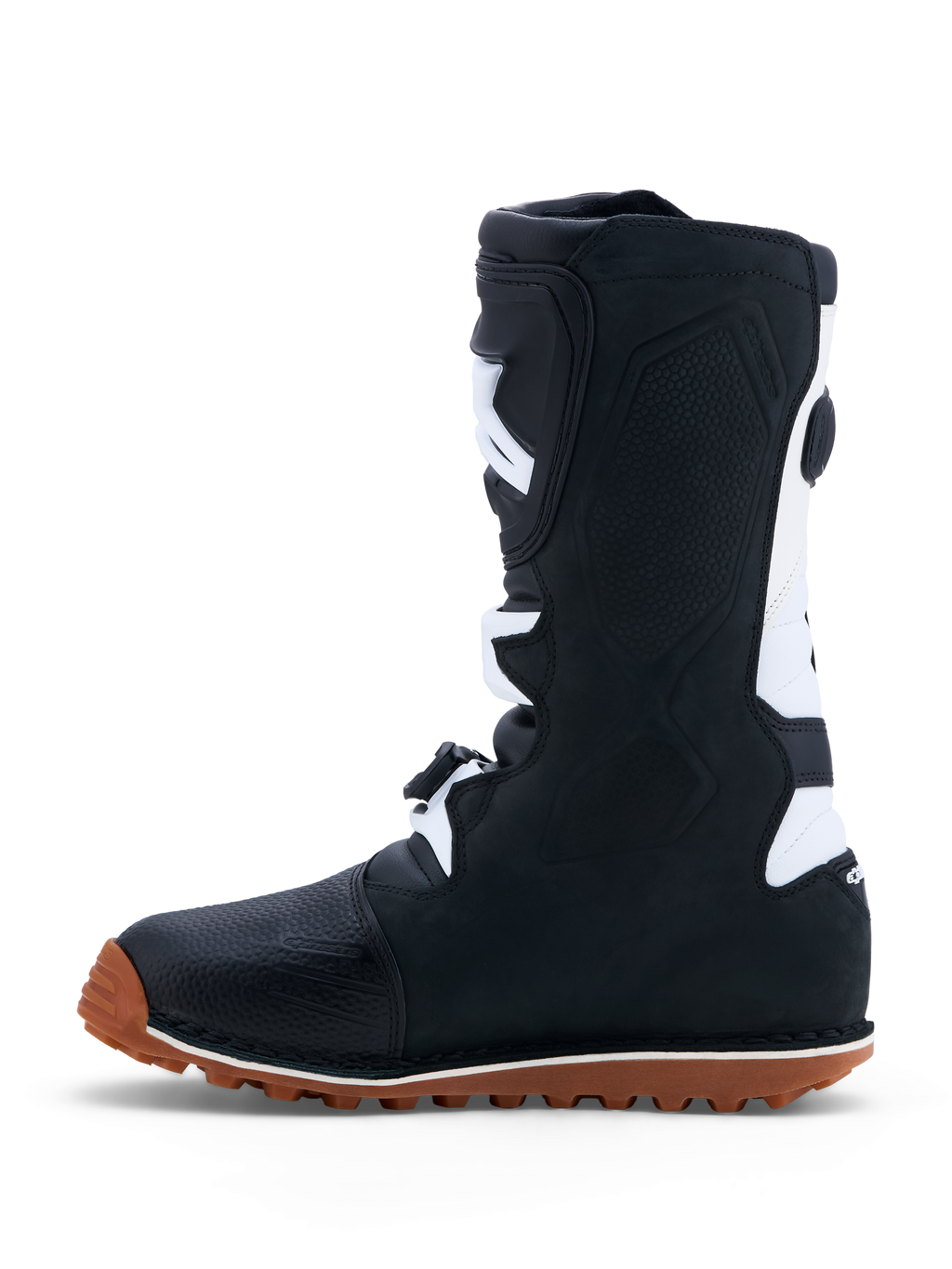 Alpinestars Tech-T laarzen, zwart-witte trialmotorlaarzen van leer met een bruine gumzool en CE-gecertificeerde bescherming.