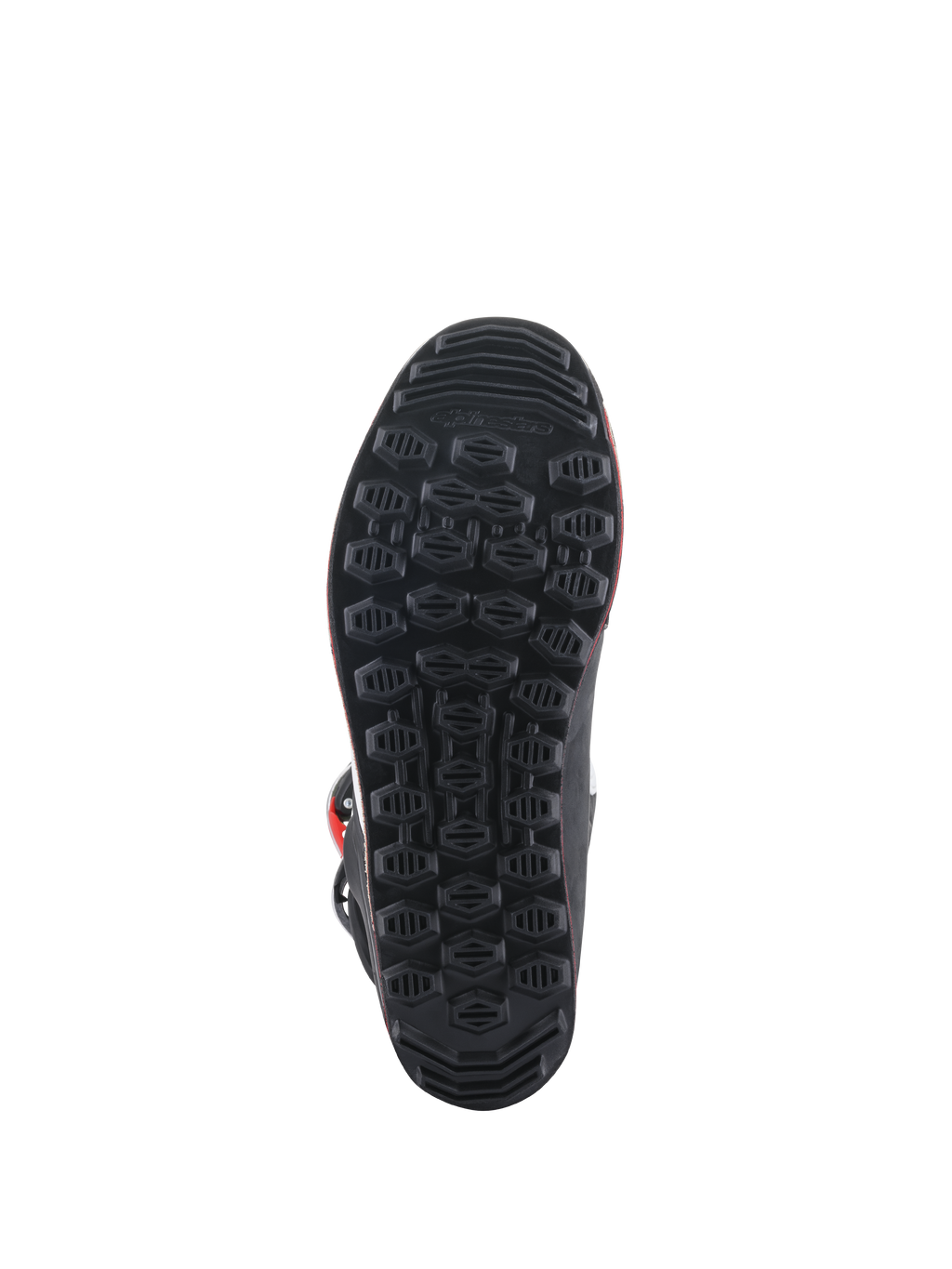 Alpinestars Tech-T Stiefel, Sohlenansicht, schwarze Gummiaußensohle mit strukturiertem hexagonalem Grip-Muster, entwickelt für Sensibilität beim Trial-Fahren und Kontrolle auf den Fußrasten.