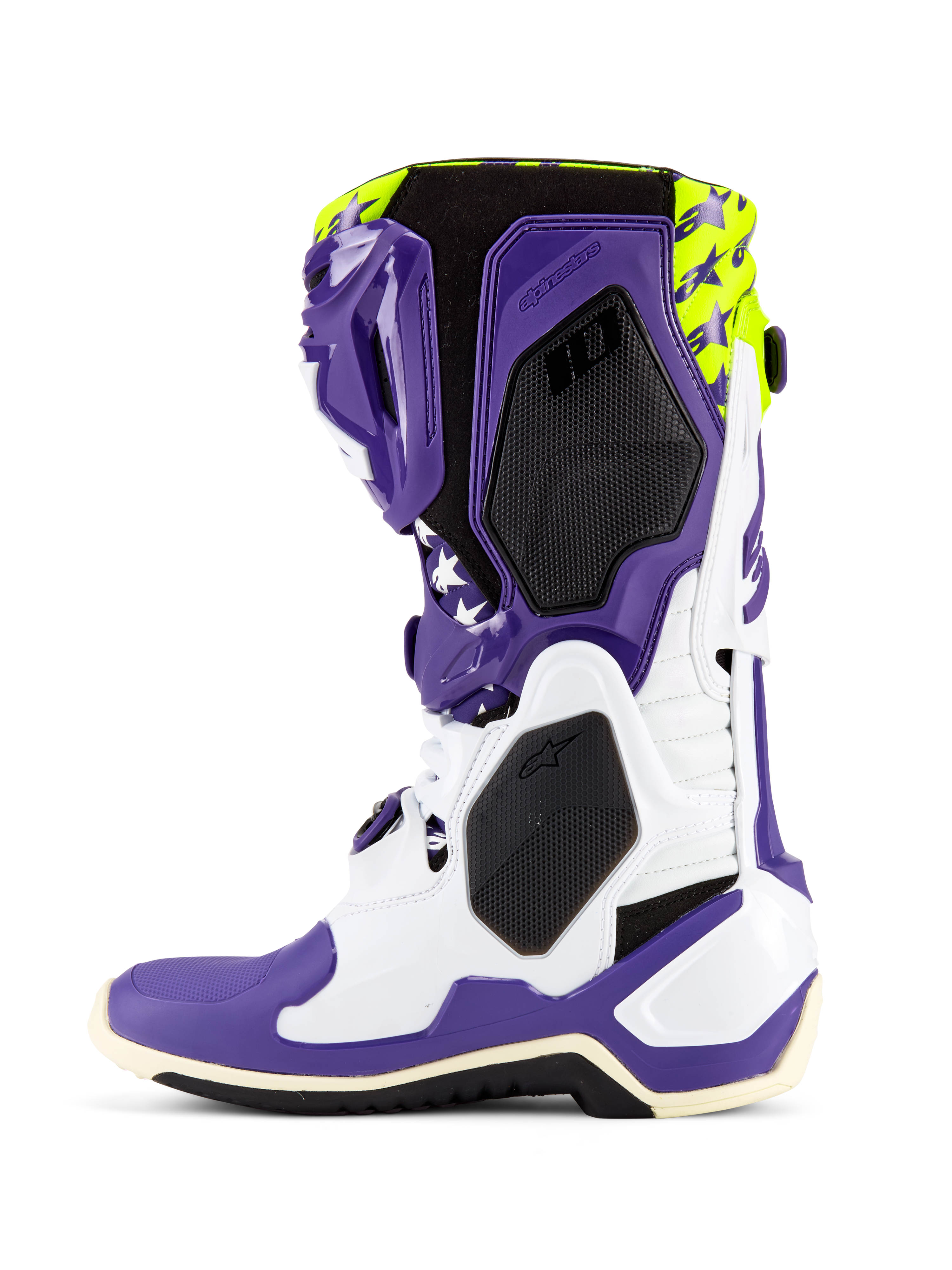 Alpinestars Tech 10 Dirt Studios® LE Stiefel, Motocross-Stiefel, Weiß, Lila und Gelb Fluo, Seitenansicht mit weiß-lila TPU-Chassis, oberer Bereich in Gelb Fluo mit Sterngrafiken, schwarze Wabenstruktur-Paneele und professionelles Offroad-Renndesign.