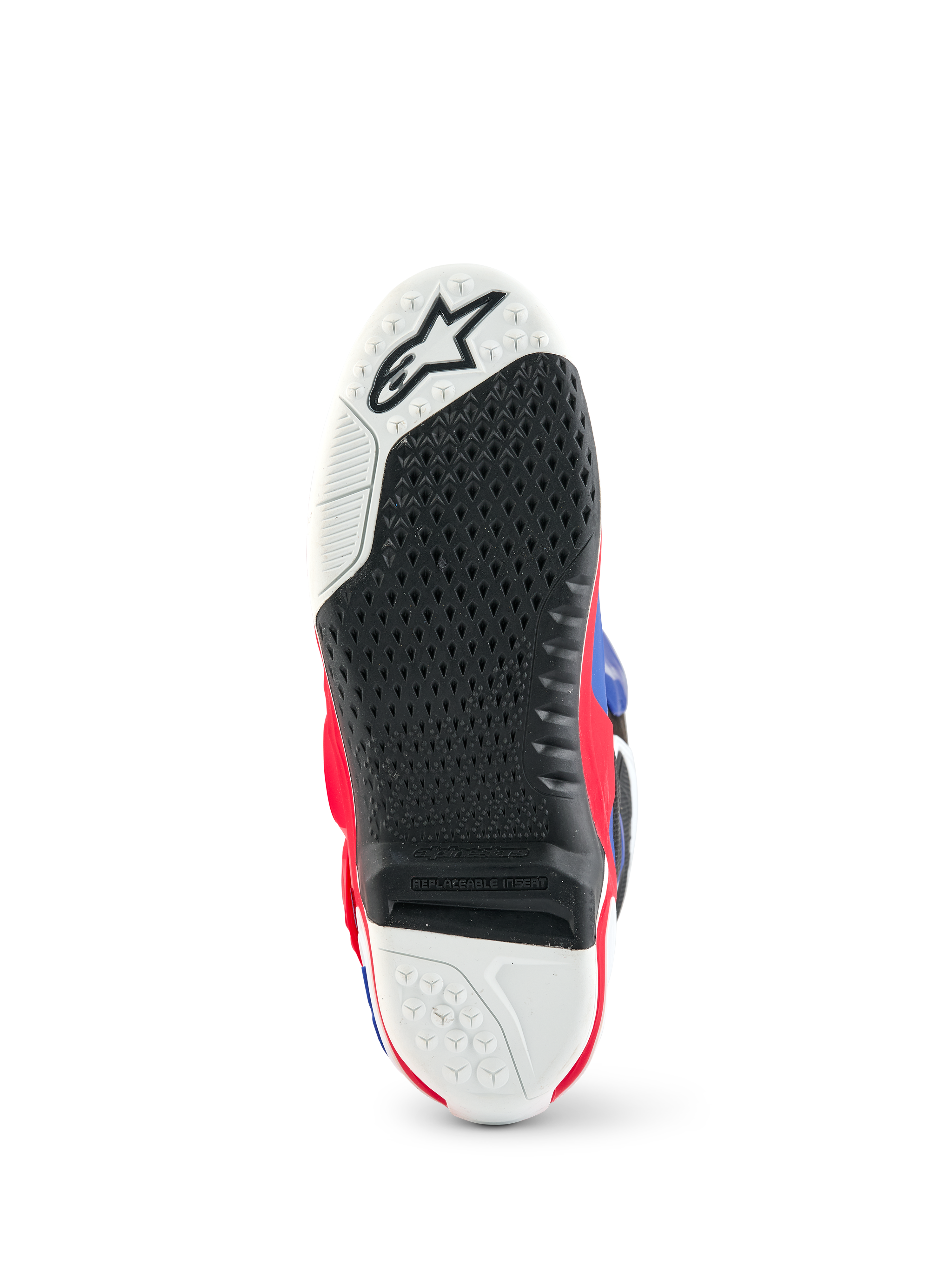 Alpinestars Limited Edition Fortitude Tech 10 Stiefel, Sohlenansicht des Motocross-Stiefels, schwarz-weißes strukturiertes Gripmuster, austauschbarer zentraler Einsatz, Akzente in Bright Red, White und Blue, strapazierfähige Konstruktion für Offroad-Performance