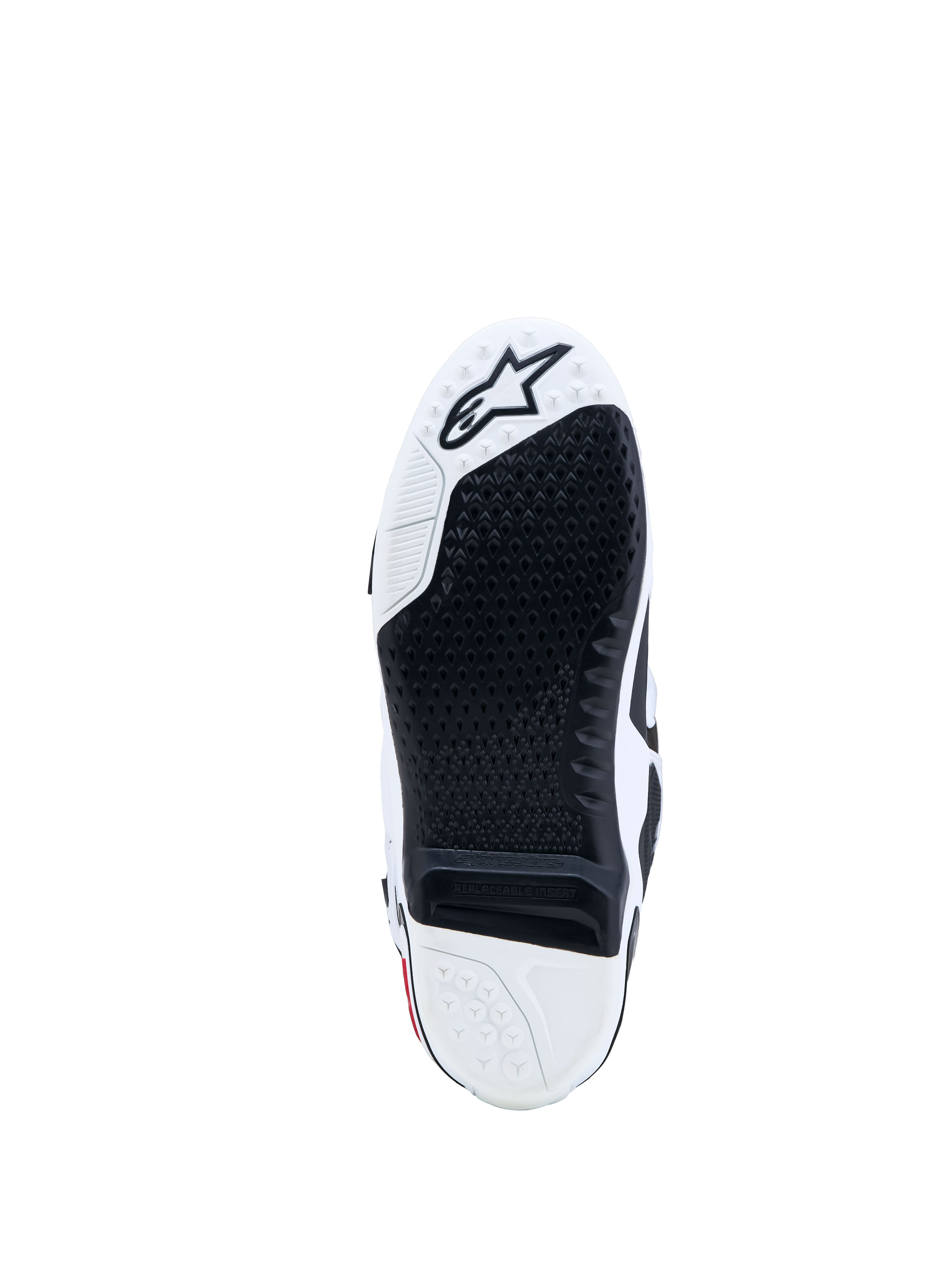 Alpinestars Tech-10 laarzen, motocrosszool in zwart en wit met een vervangbaar grip-inzetstuk en ster-logo.
