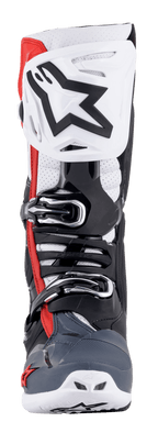 Alpinestars Tech 10 Supervented laarzen, vooraanzicht, zwart, wit, grijs en rood, met een geventileerde scheenplaat met groot zwart ster-logo, micro-verstelbaar gespsysteem, geperforeerde zones voor luchtstroom en een duurzaam TPU-beschermingschassis voor motorcross.