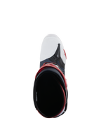 Alpinestars Tech 10 Supervented laarzen, bovenaanzicht kijkend in de opening van de laars, Night Navy White Rainbow, voorzien van een witte geventileerde neus en rode accenten, hoogwaardig motorcross-schoeisel ontworpen voor maximale luchtstroom.