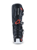 Alpinestars 2026 Tech 7 Enduro Drystar® laarzen, enduro motocrosslaarzen, zwart, fluo rood en wit, achteraanzicht met focus op de TPU-beschermende schaal, Alpinestars-logo, biomechanisch draaipunt en witte versteviging van de onderzool.