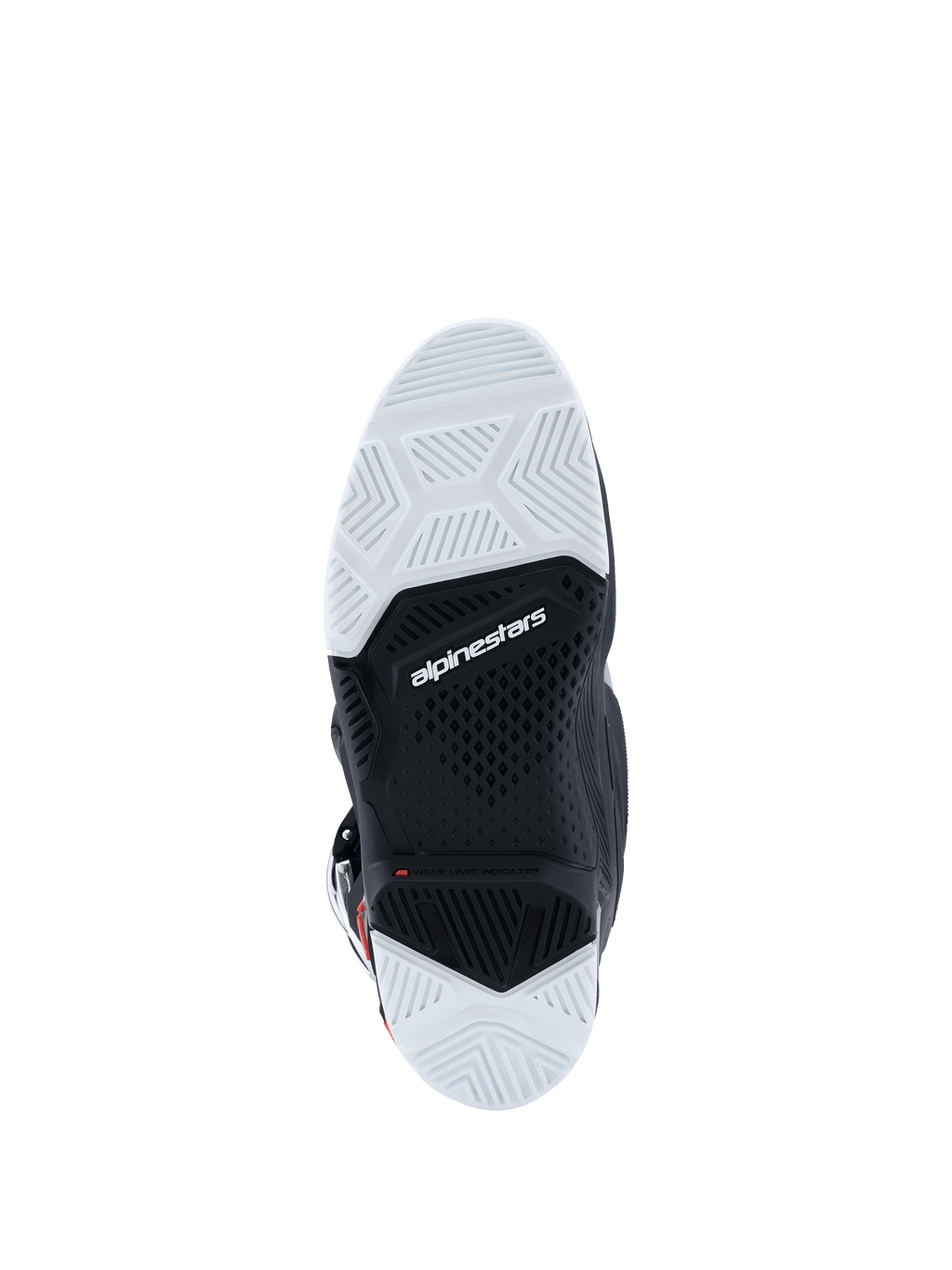 Alpinestars 2026 Tech 7 Enduro Drystar® laarzen, onderaanzicht van de zool, zwart en wit rubbermengsel met dubbele dichtheid, getextureerde geometrische grippatronen, Alpinestars-logo en slijtage-indicator, ontworpen voor off-road- en enduro-tractie