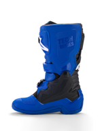 Alpinestars Yamaha Youth Tech 7S laarzen, jeugd motorcrosslaarzen, blauw met zwarte en witte accenten, zijaanzicht, met 'Tech Series' logo in reliëf, TPU-beschermingspanelen, gespsluiting en een duurzame blauwe zool voor off-road prestaties.