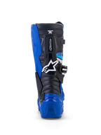 Alpinestars Yamaha Youth Tech 7S laarzen, motorcrosslaarzen, blauw, zwart en wit, achteraanzicht met focus op TPU hiel- en kuitbescherming, wit ster-logo en duurzaam pivot-systeemontwerp