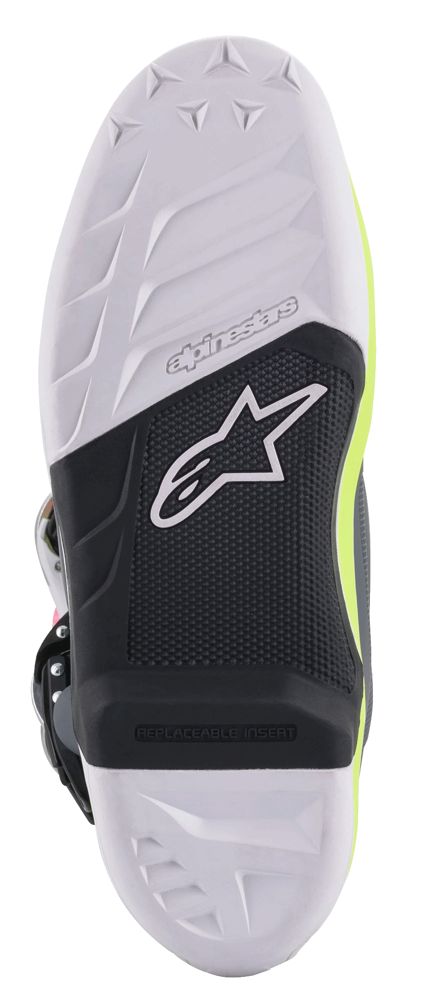 Alpinestars Tech 7 laarzen, motorcrosslaarzen, gedetailleerd zicht op de zool met een wit en zwart samengesteld ontwerp, vervangbare voetsteuninzet, gestructureerde grip met het Alpinestars sterlogo en fluorescerende gele accenten