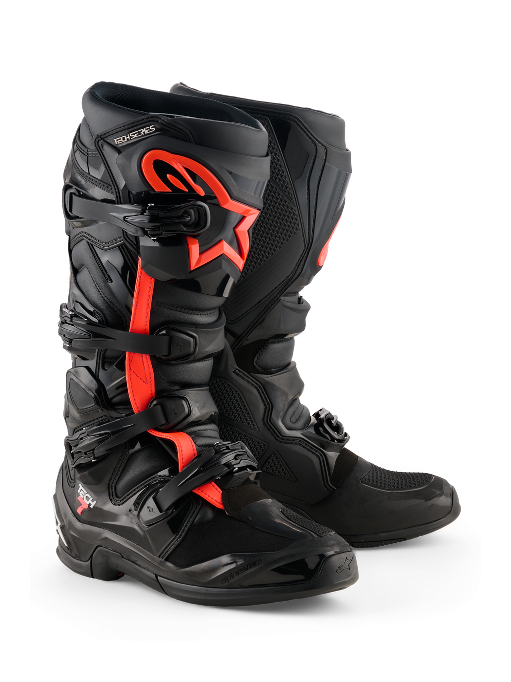 Bottes Alpinestars Tech 7, bottes de motocross, noir et rouge fluo, avec quatre boucles noires, plaque tibiale en TPU et logo étoile Alpinestars rouge sur le côté, design tout-terrain robuste